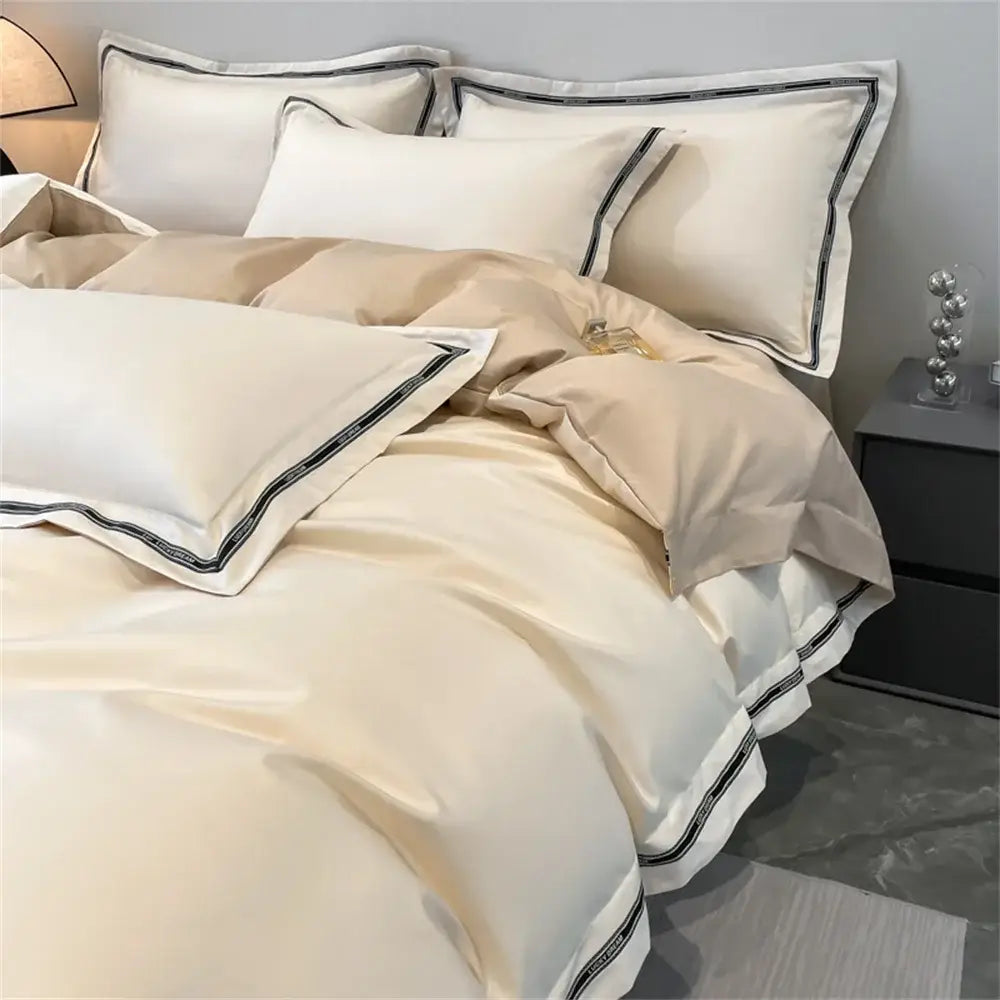 Cream and black egyptian cotton bedding set with cream satin and elegant black piping trim for bedroom linens