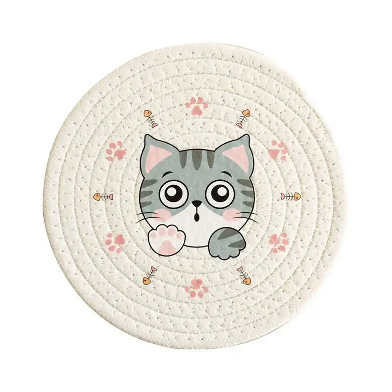 Cream braided rope cat print round coaster heat pad with an off-white woven mat and gray tabby cat decorbites cat print
