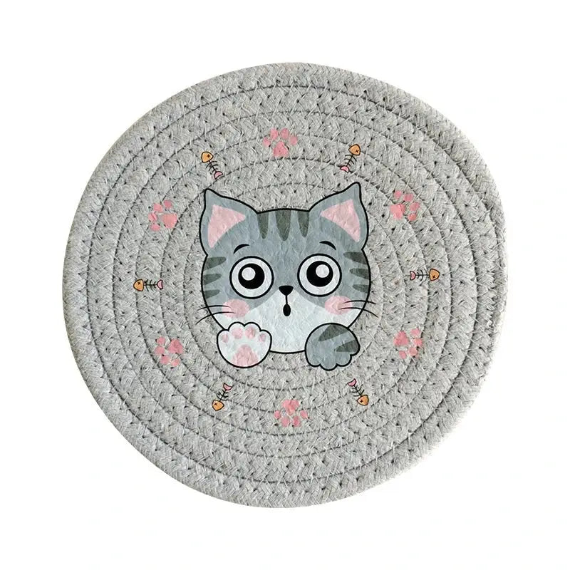 Gray woven circular mat cat print with cartoon tabby and fish skeletons cream braided rope cat print round coaster
