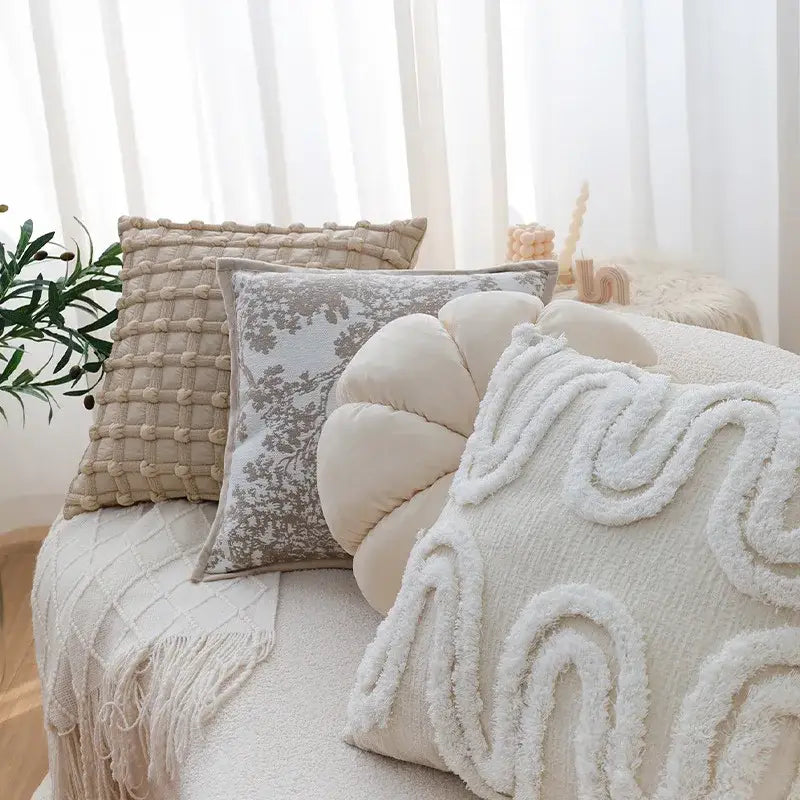 Cream cushion cover with textured bubble plaid design and plush wavy fringe for elegant living room decorbites decor