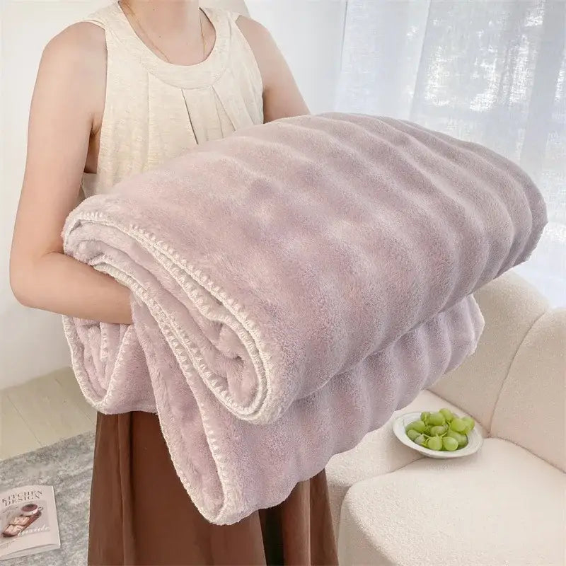 A plush lavender bubble velvet woolen sofa blanket with cozy texture and stitched edges for living room decorbites use