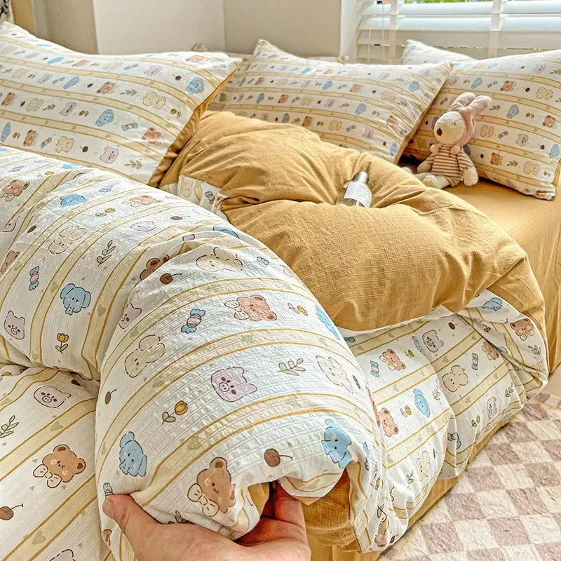 Cute beige and blue cartoon pattern cotton bedding set with striped design from decorbites cartoon pattern collection