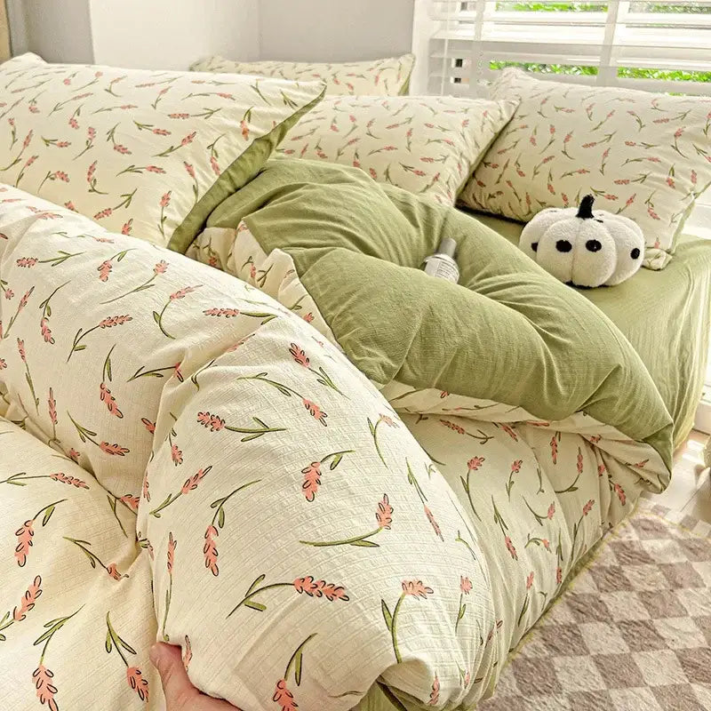Soft cream-colored cotton bedding set with delicate pink rose cartoon pattern and olive-green pillowcase decorbites cartoon pattern cotton