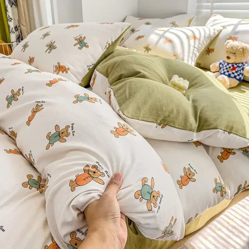 White duvet cover featuring a decorbites cartoon pattern of orange and green bears in soft cotton bedding set fabric