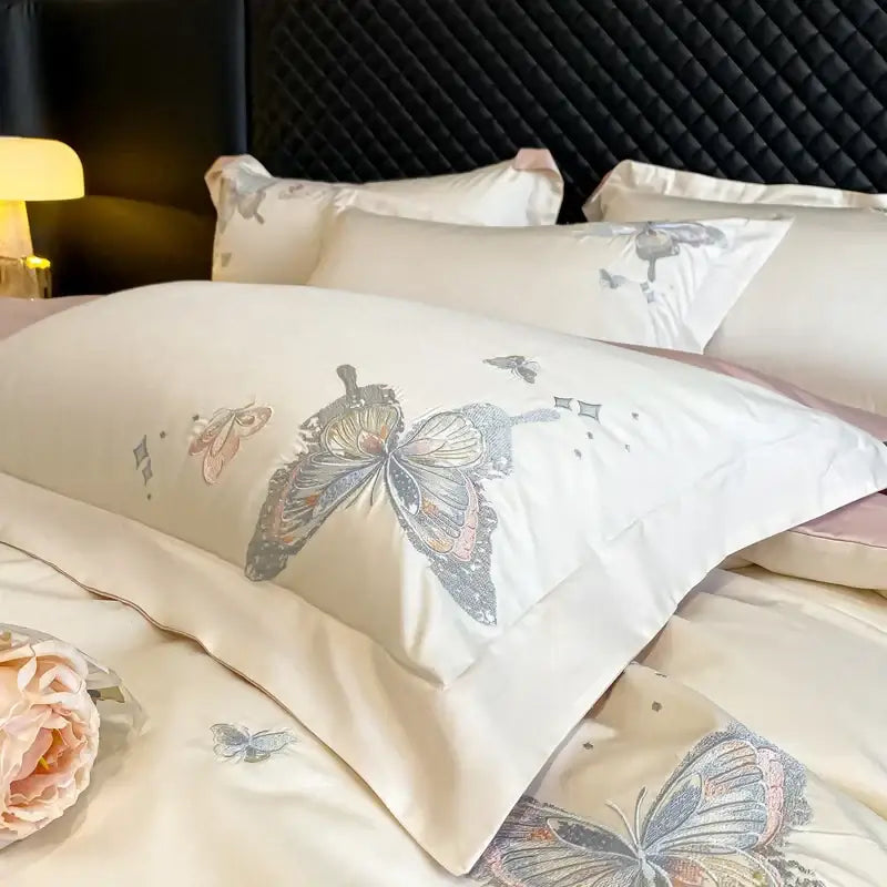 Cream satin pillowcase with decorbites butterfly embroidery in metallic thread part of butterfly embroidery 800tc bedding set