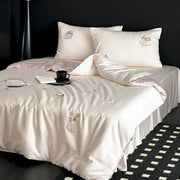 Cream cartoon embroidered ice silk bedding set in cream satin with delicate bunny decorbites cartoon embroidered design