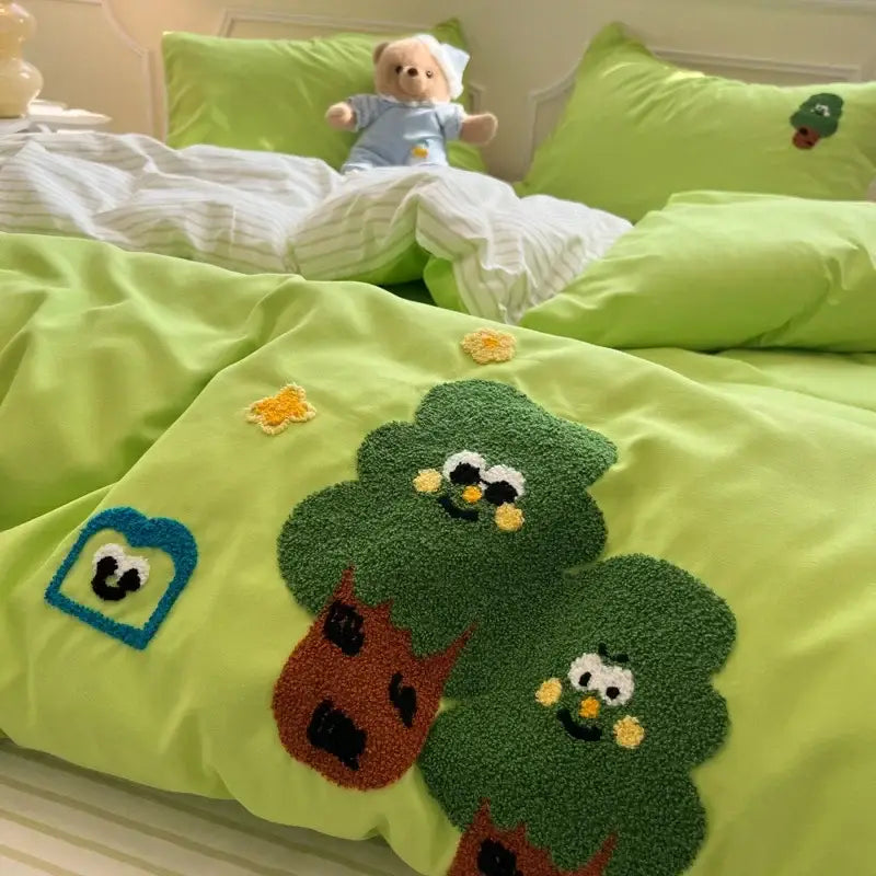 Cream cartoon embroidery jacquard lime green plush tree-themed duvet cover with embroidered faces and brown trunks