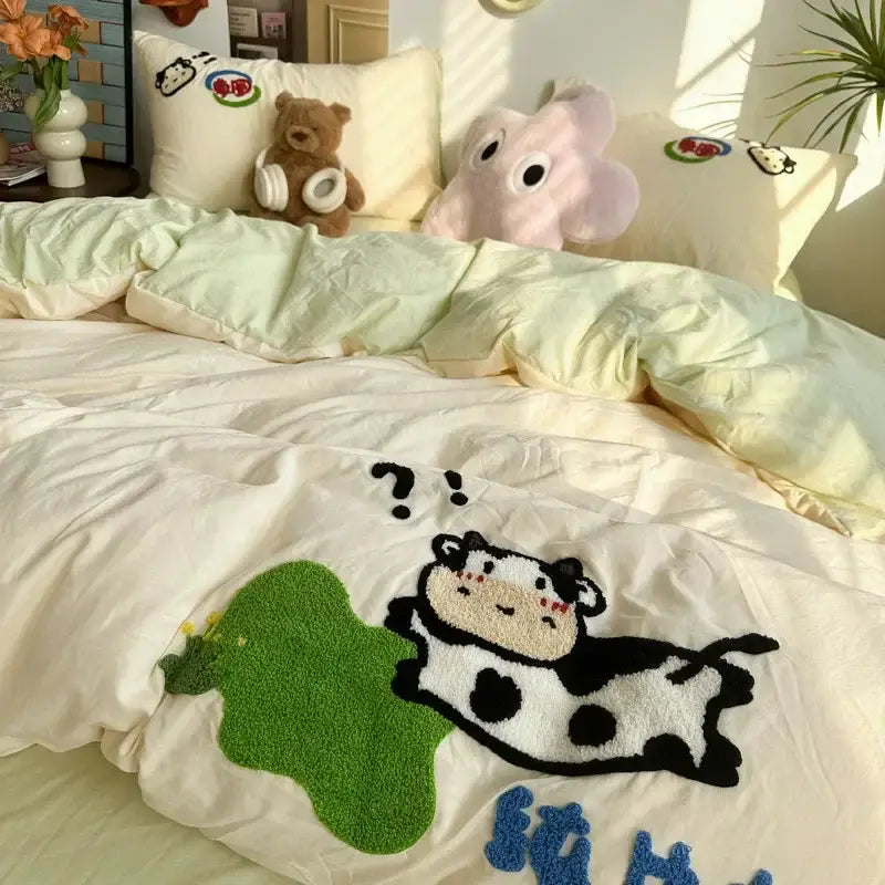 Cream cartoon embroidery jacquard duvet cover with plush black and white cow and green grass patch for bedroom linen