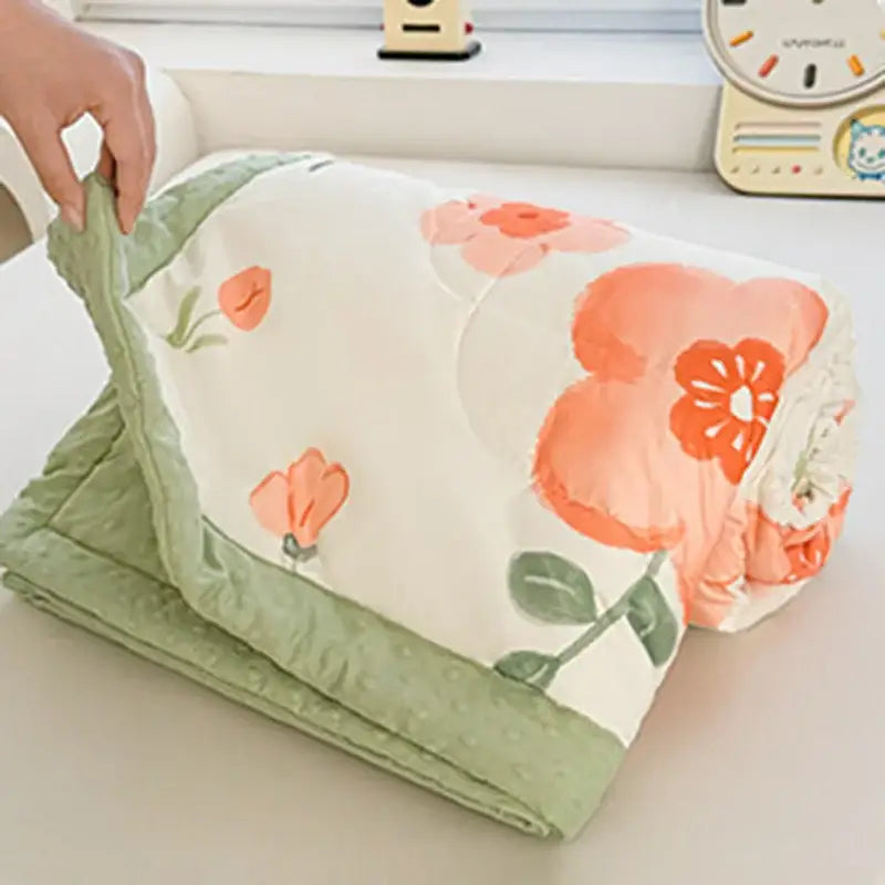 Cream cartoon pattern summer quilt with a soft duck comforter featuring coral floral design and plush mint-green border