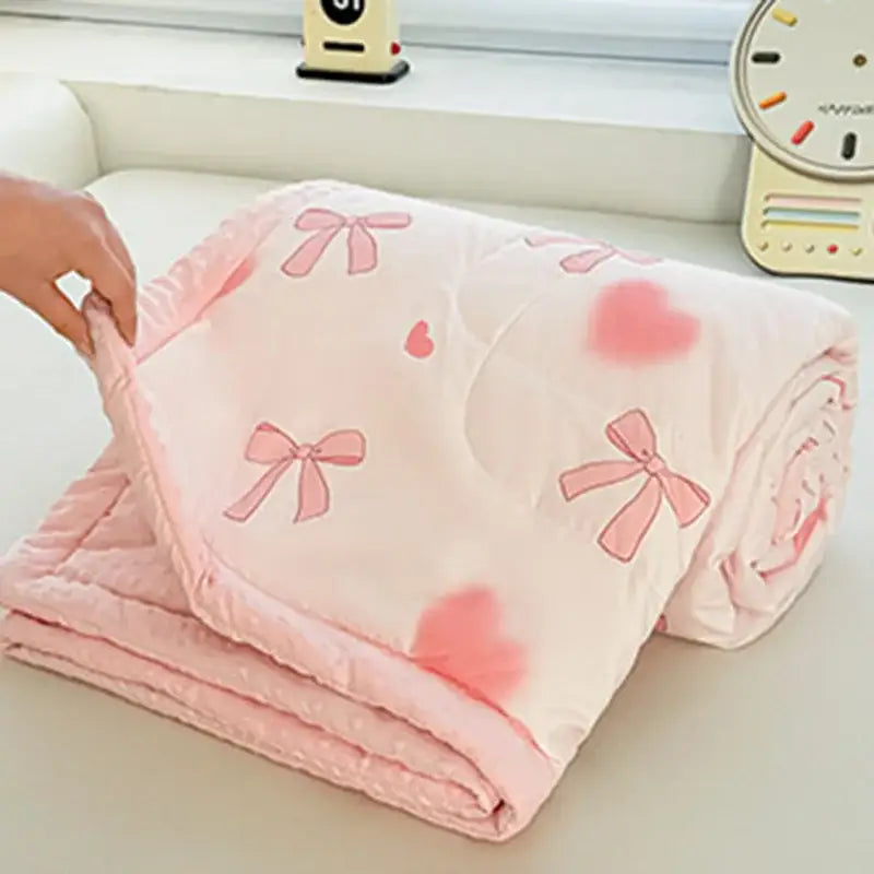 Pink quilted cartoon pattern summer quilt with soft plush texture and pastel bows and hearts for bedroom decorbites