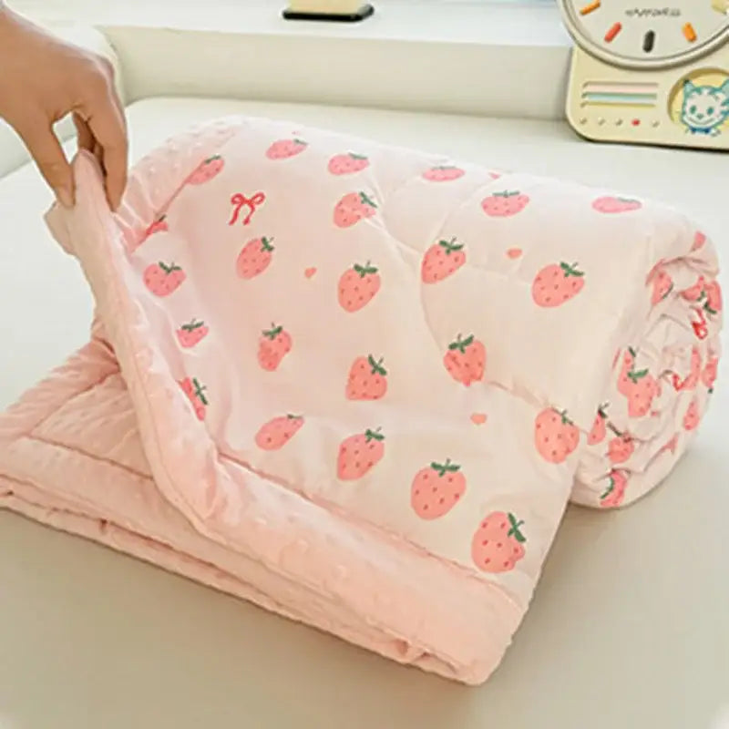 Cream cartoon pattern summer quilt featuring a pink strawberry-patterned soft plush texture for bedroom decorbites cartoon pattern comfort