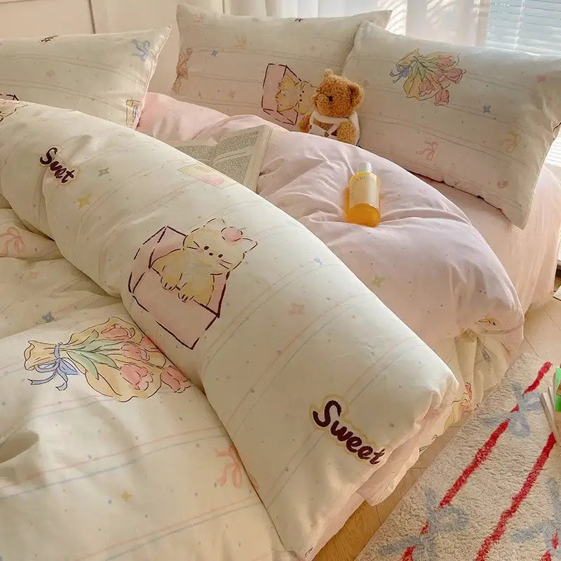 Cream cartoon printed cotton bedding set features a cream duvet cover with pastel cats flowers and sweet decorbites cartoon printed design