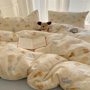Cream cartoon printed cotton bedding set featuring plush texture and pastel yellow and blue bear decorbites cartoon printed design