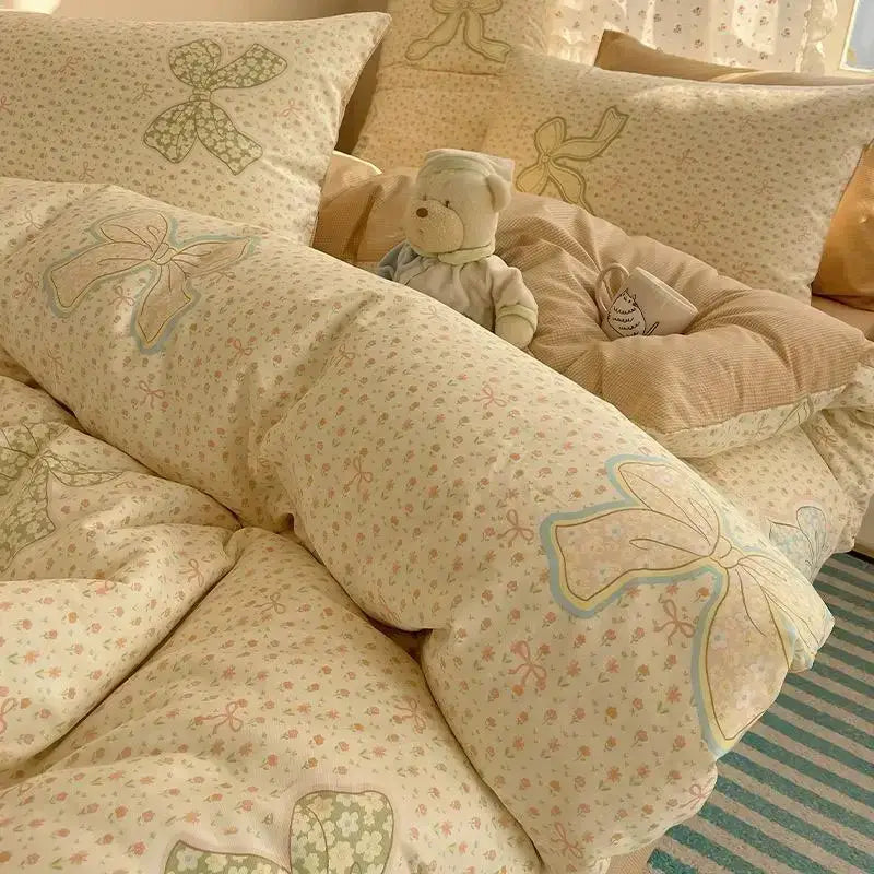 Cream cartoon printed cotton bedding set with cream-colored quilted duvet cover embroidered bows and floral decorbites cartoon printed design