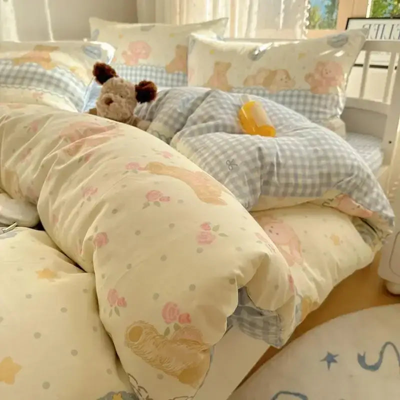 Cream cartoon printed cotton bedding set with cream duvet cover featuring pastel floral bear prints and blue gingham decorbites patterns