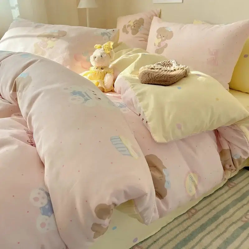 Pastel pink and pale yellow bedding set featuring soft plush cartoon printed cotton fabric with bear decorbites design