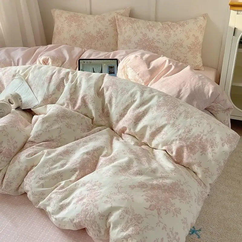 Pink floral-patterned duvet cover set with soft textured fabric in cream cartoon printed cotton bedding set decorbites design