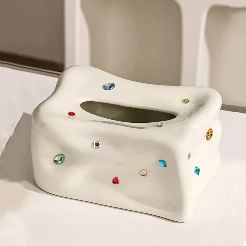 Cream ceramic heart gemstone tissue box with whimsical bone shape and colorful decorbites heart gemstone accents