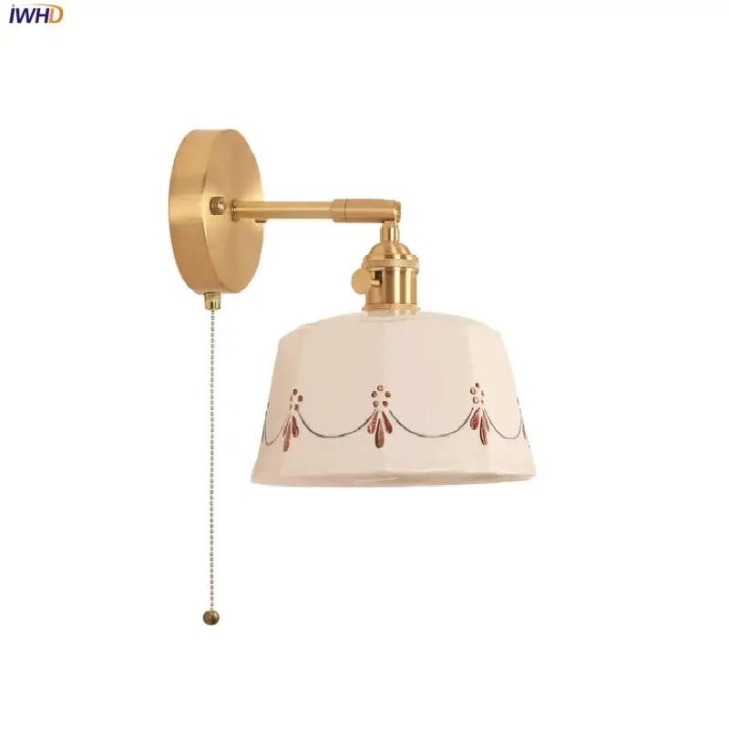 Cream ceramic led wall lamps with delicate red and black decorative motifs on brass-finished sconce for bedroom decorbites ceramic led