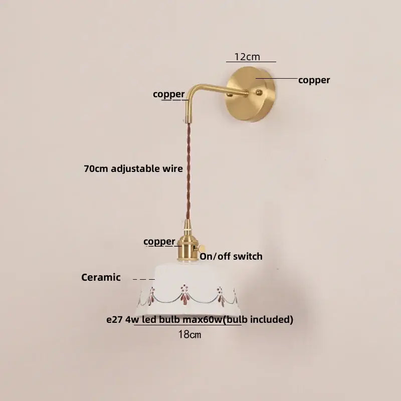Cream ceramic led wall lamp with brass copper arm and floral decorative motifs for bedroom decorbites ceramic led lighting