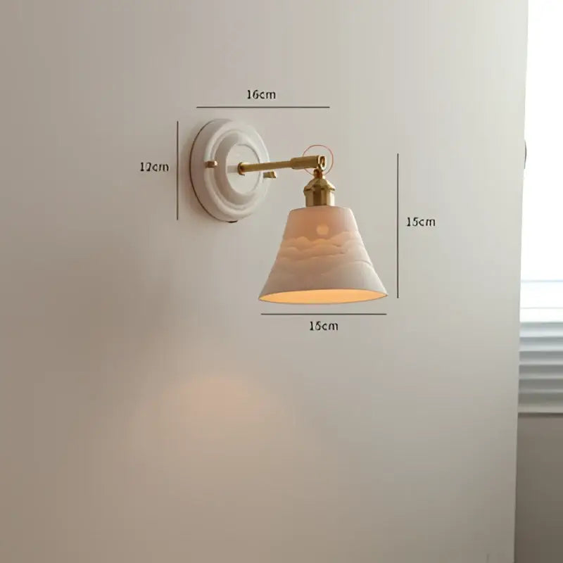 Cream ceramic led wall light with copper arm and decorative cloud motif shade for bedroom decorbites ceramic led use