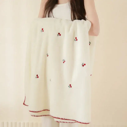 Cream cherry velvet embroidered blanket in cream with red cherry embroidery and matching zigzag border baby velvet throw