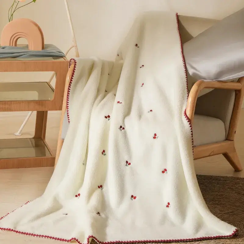 Cream cherry velvet embroidered blanket with cream baby velvet fabric red cherry embroidery and pom pom trim