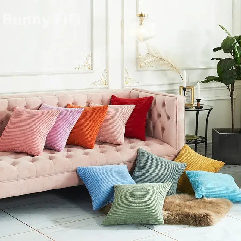 A collection of cream and colorful decorbites corduroy striped cushion covers with ribbed texture for living room decor