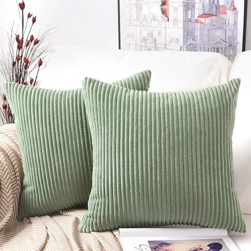Two sage green corduroy striped cushion covers with vertical ribbed texture for living room decorbites throw pillows