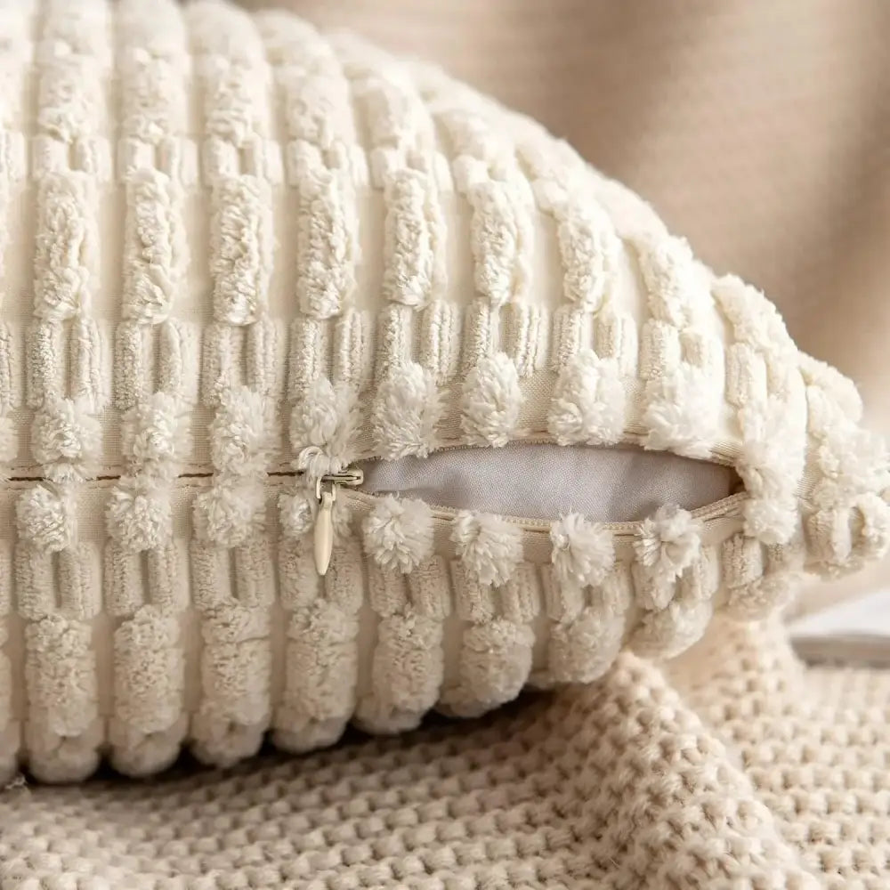 Cream corduroy striped throw pillow cover in cream with fluffy pom-pom accents for living room decorbites pillow covers