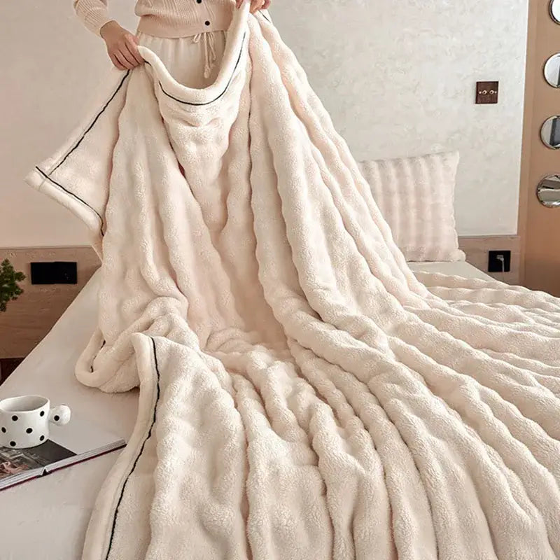 Cream cozy bubble faux rabbit fur blanket with cream ribbed texture and black piping for bedroom decorbites cozy bubble