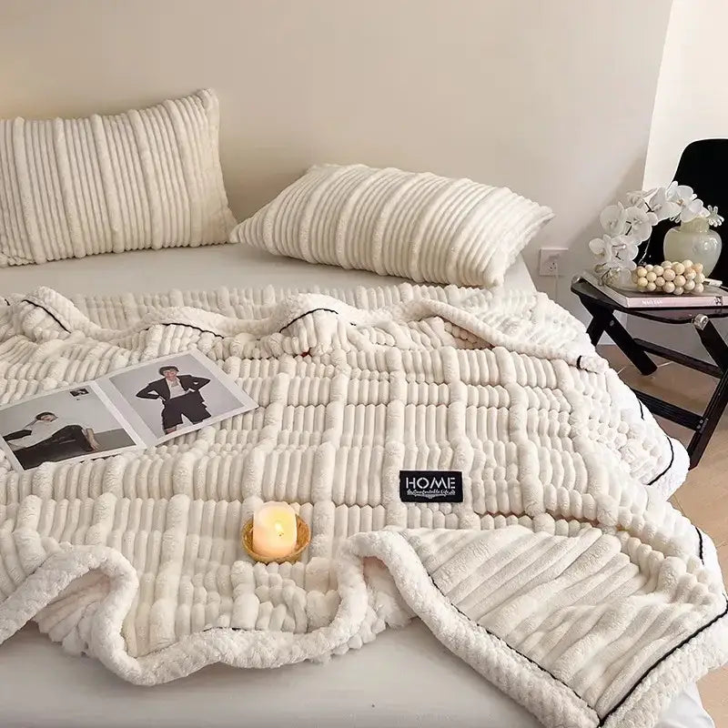 Cream plush blanket with cozy faux rabbit texture and black piping edge perfect for bedroom decorbites cozy faux use