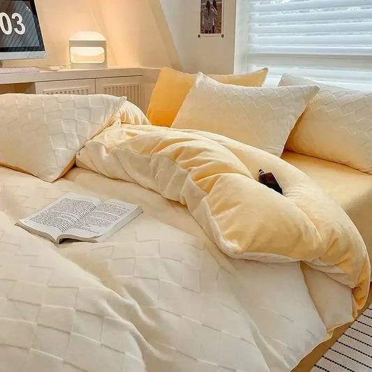 Cream cozy milk fleece bedding set featuring a cream quilted duvet cover with plush texture and matching pillows