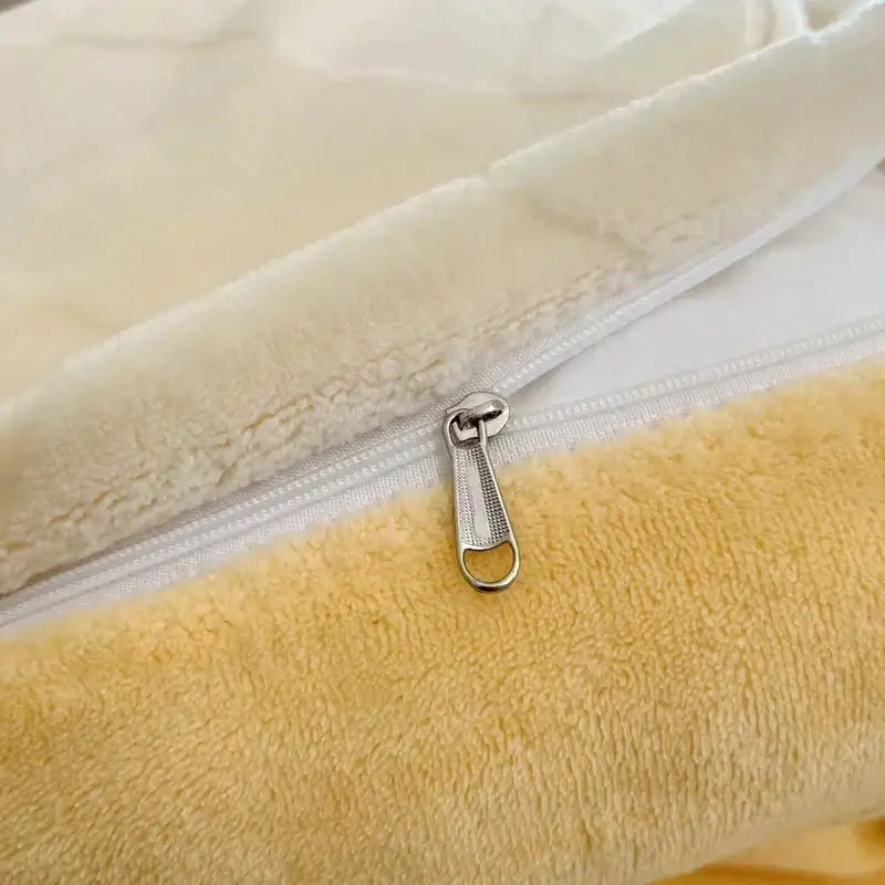 A silver-toned zipper with textured pull tab on cream cozy milk fleece bedding set quilted duvet cover from decorbites