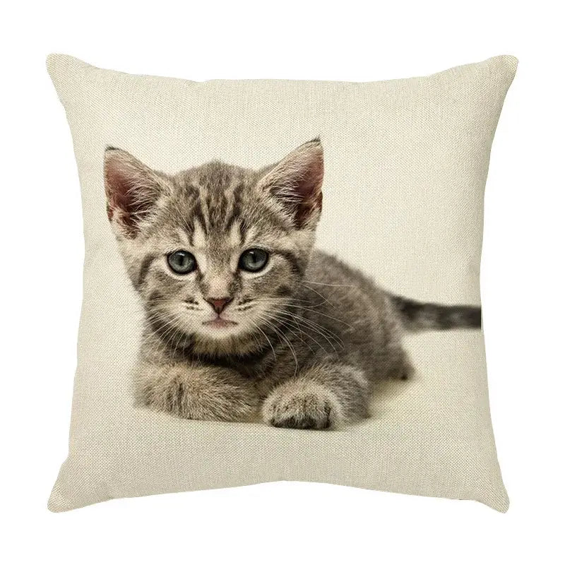 Beige linen throw pillow with a cute cat face decorative gray tabby kitten featuring striking blue eyes for living room