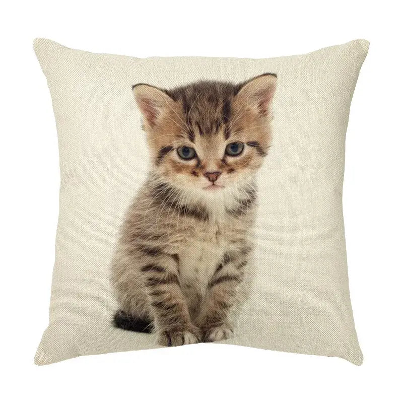 Beige linen throw pillow with cute cat face printed, featuring blue-eyed tabby kitten for living room decor