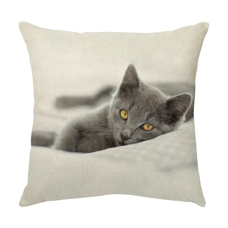 Beige linen throw pillow with cute cat face print of gray kitten with yellow eyes for living room decor