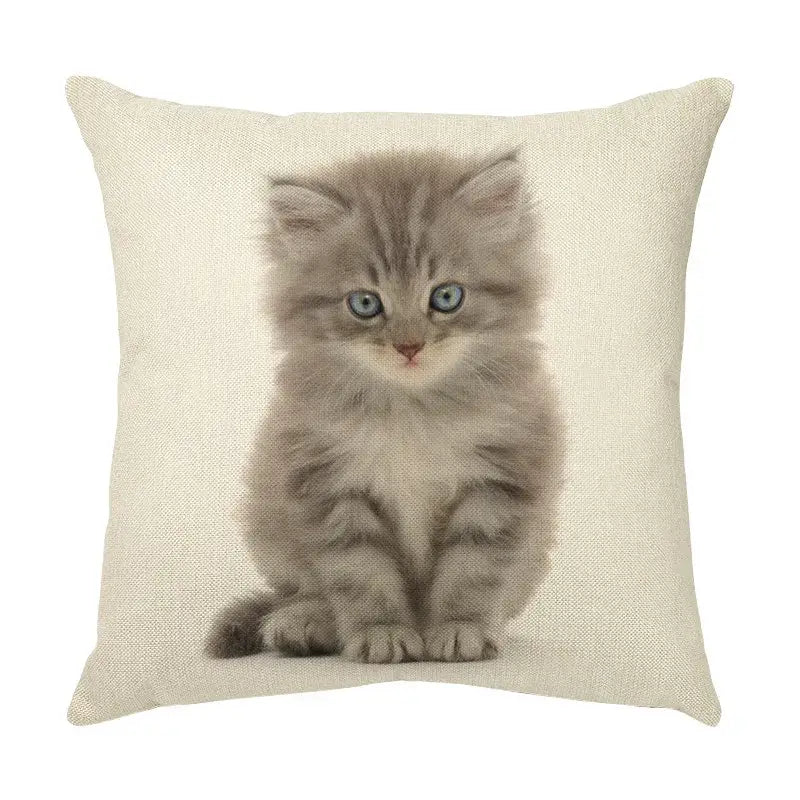 Beige linen throw pillow with a cute cat face decorative print of a gray tabby kitten for living room use