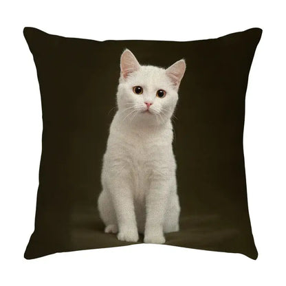 Black throw pillow with a cute cat face decorative printed image of a white cat for living room use