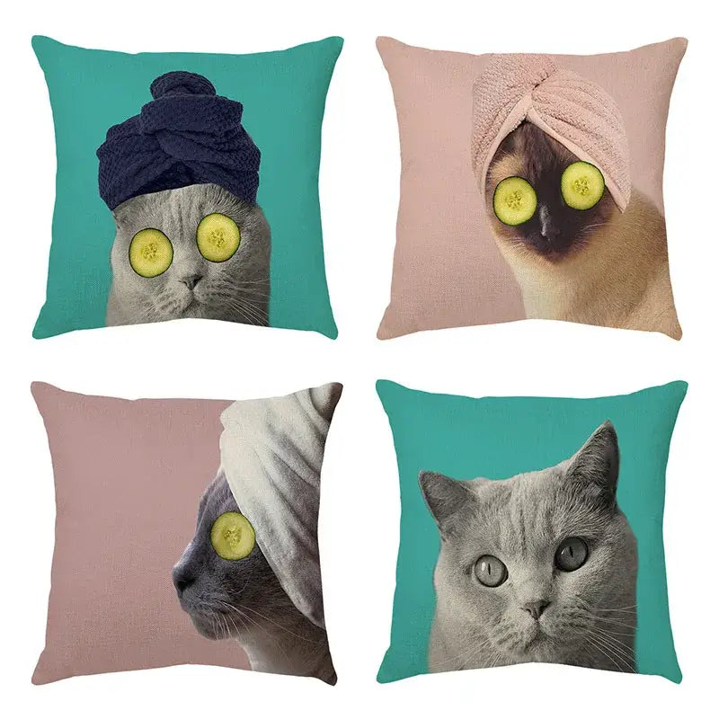 Set of four square cream cat face decorative cushion covers with cute cat face spa prints on teal and blush backgrounds