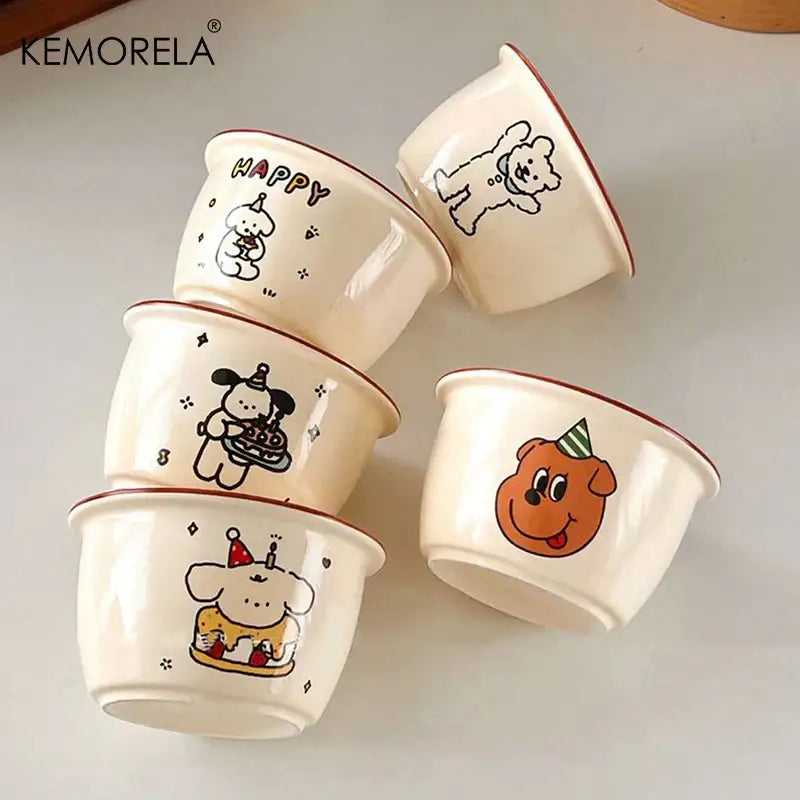 Cream dog illustration carton ceramic soup bowls in cream color with red rims featuring festive dog poses for kitchen use