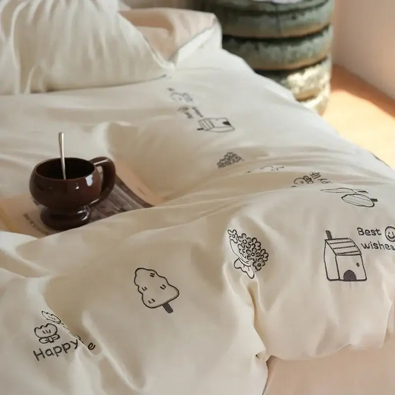 Cream embroidered brushed volcanic fleece bedding set with cream duvet cover featuring black minimalist tree flower and house illustrations