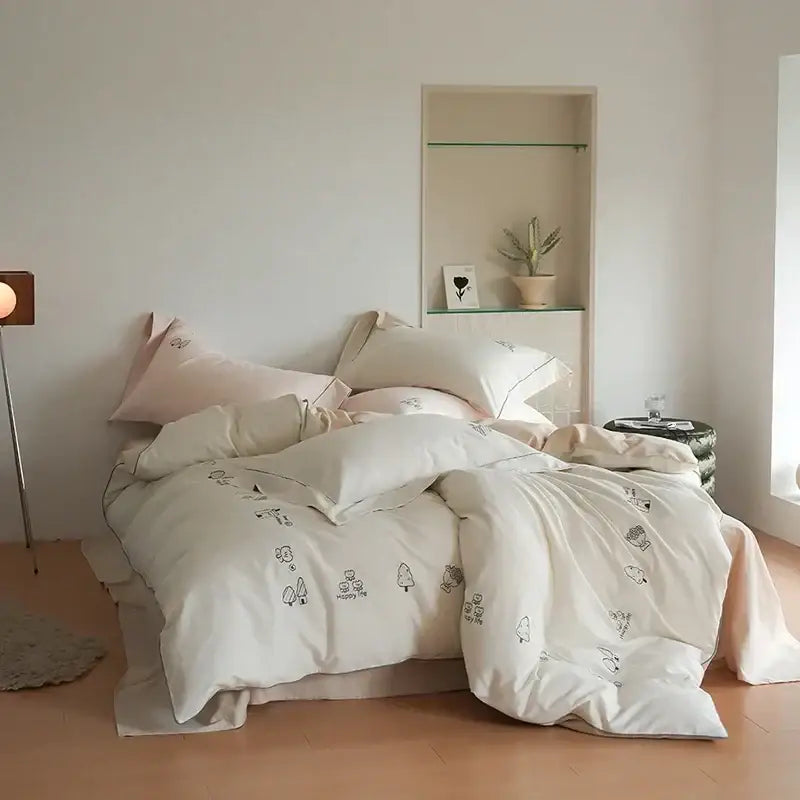 Cream embroidered brushed volcanic fleece bedding set with delicate black woodland creature embroidery