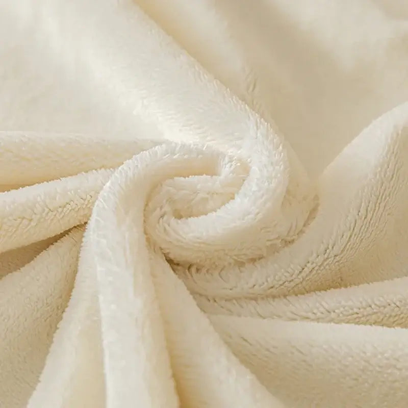 Cream embroidered cozy velvet fitted sheet in cream with a soft textured surface and plush cozy velvet appearance