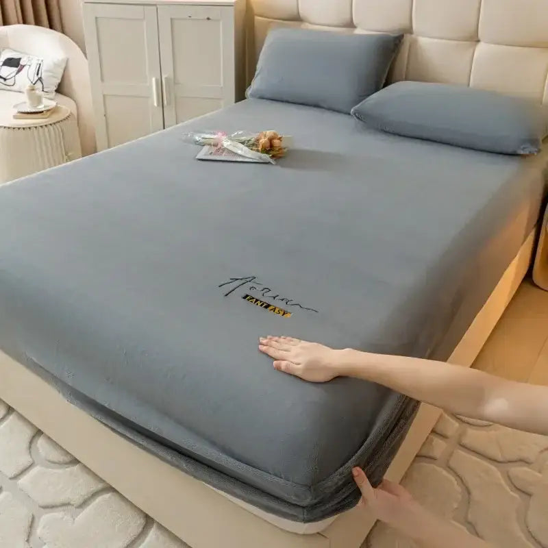 Cream embroidered cozy velvet fitted sheet in light gray with subtle fabulous logo in gold thread for bedroom decorbites cozy velvet fitted use