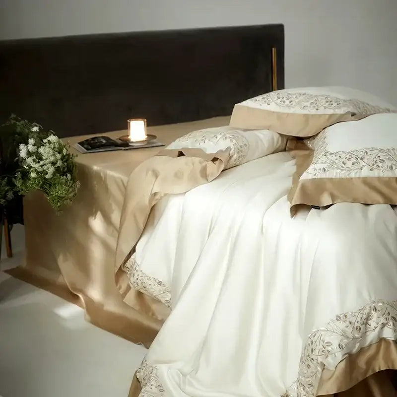 Cream embroidered egyptian cotton bedding set with cream satin bedspread and floral trim for elegant bedroom decor