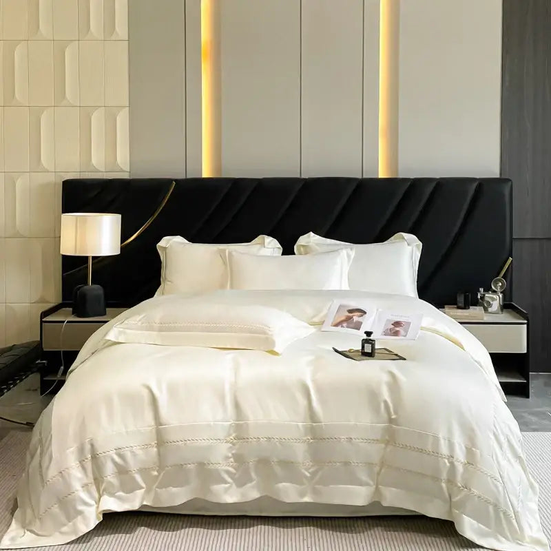 Cream embroidered ice silk bedding set in cream color with subtle gold embroidery on satin for bedroom use
