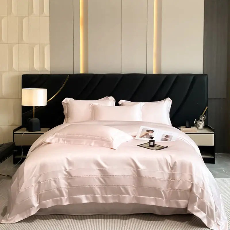 A luxurious blush pink satin duvet cover from cream embroidered ice silk bedding set with subtle horizontal stitching