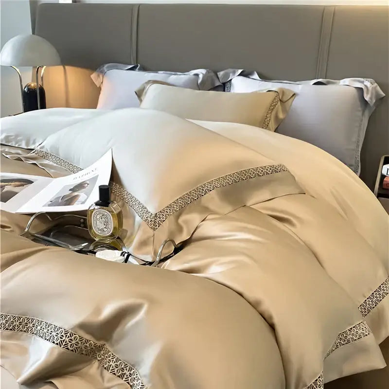 Beige satin bedding set with gold geometric embroidery edges made of cream eucalyptus fiber lace for bedroom comfort