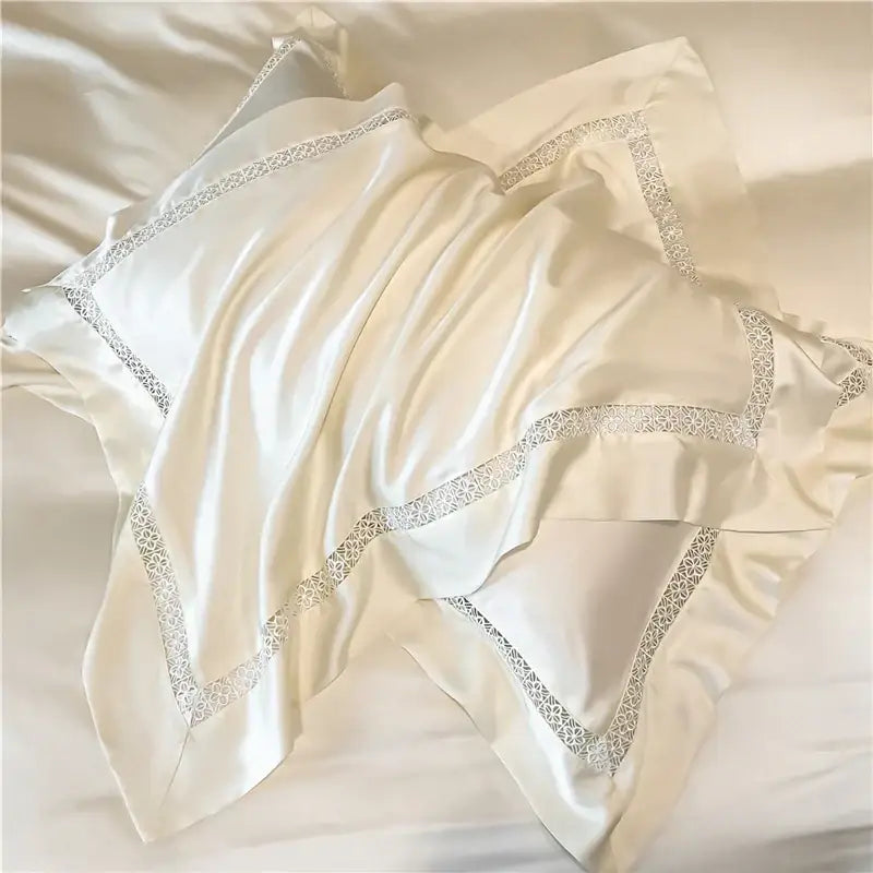 Cream-colored silk pillowcase with delicate lace trim from decorbites eucalyptus fiber bedding set for bedroom comfort